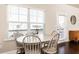 Bright and airy kitchen nook with a table and chairs near the deck at 830 Corsiglia, Marietta, GA 30060