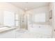 Main bathroom with soaking tub, walk-in shower, and double vanity at 830 Corsiglia, Marietta, GA 30060