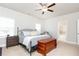 Main bedroom with king bed, ensuite bathroom access, and ample natural light at 830 Corsiglia, Marietta, GA 30060