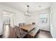 Bright dining room with wood table and bench at 102 Freedom Dr, Acworth, GA 30102