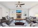 Living room featuring fireplace, two sofas, and coffee table at 102 Freedom Dr, Acworth, GA 30102