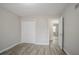 Bedroom with double doors and hardwood floors at 2026 Morris Dr, Riverdale, GA 30296