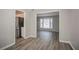 Dining room with hardwood floors and view of living room at 2026 Morris Dr, Riverdale, GA 30296