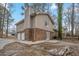 Rear view of house, showing brick and siding at 2026 Morris Dr, Riverdale, GA 30296