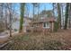 Ranch house exterior with partial brick and vinyl siding at 2026 Morris Dr, Riverdale, GA 30296