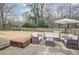 Large backyard with patio furniture and firepit at 2295 Cloverdale Se Dr, Atlanta, GA 30316