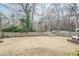 Spacious backyard with a hammock and wooden fence at 2295 Cloverdale Se Dr, Atlanta, GA 30316