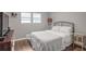 Light and bright bedroom with a double bed and hardwood floors at 2295 Cloverdale Se Dr, Atlanta, GA 30316