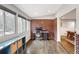 Home office with brick accent wall and hardwood floors at 2295 Cloverdale Se Dr, Atlanta, GA 30316