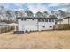 Back exterior view showing a house with large yard at 2295 Cloverdale Se Dr, Atlanta, GA 30316