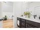 Modern bathroom with double vanity and dark cabinetry at 330 Mount Zion Rd, Hapeville, GA 30354