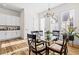 Light and airy dining area with glass-top table and access to the backyard at 330 Mount Zion Rd, Hapeville, GA 30354