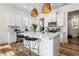 Modern kitchen with white cabinets, quartz countertops, and stainless steel appliances at 330 Mount Zion Rd, Hapeville, GA 30354