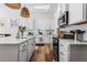 Well-equipped kitchen featuring white cabinetry, quartz countertops, and stainless steel appliances at 330 Mount Zion Rd, Hapeville, GA 30354