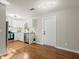 Open concept dining area with hardwood floors and kitchen view at 3460 Fairlane Dr, Atlanta, GA 30331