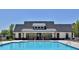 Resort-style pool with clubhouse and lounge chairs at 399 Tillman Pass, Woodstock, GA 30188