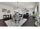 Bright dining area with dark hardwood floors and modern decor at 399 Tillman Pass, Woodstock, GA 30188