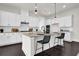 Kitchen island with granite countertop and seating for two at 399 Tillman Pass, Woodstock, GA 30188