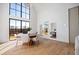 Elegant dining area with large windows and hardwood floors at 5180 Howard Rd, Cumming, GA 30040