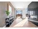 Bright entryway with modern wood wall and view to backyard at 5180 Howard Rd, Cumming, GA 30040