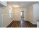 Bright dining area featuring wood flooring and a view of the bedroom at 3002 Arabian Woods Dr, Lithonia, GA 30038