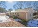 A single-story brick home featuring a well-maintained yard with mature trees and natural light at 3002 Arabian Woods Dr, Lithonia, GA 30038