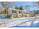 Charming home with a covered front porch and a well-maintained front yard at 3002 Arabian Woods Dr, Lithonia, GA 30038