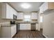 Modern kitchen with stainless steel appliances, granite countertops, and white cabinetry at 3002 Arabian Woods Dr, Lithonia, GA 30038