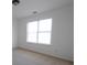 Bright bedroom featuring neutral carpet, white walls, and a window with blinds at 4259 Creek Haven Dr, Marietta, GA 30062