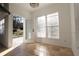 Bright breakfast nook with tile floors, large windows, and door leading to the backyard at 4259 Creek Haven Dr, Marietta, GA 30062