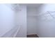 A walk-in closet featuring white shelving units for ample storage at 4259 Creek Haven Dr, Marietta, GA 30062