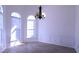 Dining room with hardwood floors, wainscoting, and large windows at 4259 Creek Haven Dr, Marietta, GA 30062