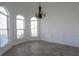 Dining room showcases wood floors, wainscoting detail, and arched windows at 4259 Creek Haven Dr, Marietta, GA 30062