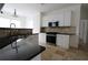 Kitchen featuring granite counters, stainless steel appliances, and tiled backsplash at 4259 Creek Haven Dr, Marietta, GA 30062