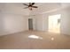 Open main bedroom with carpeted floors and a view to the ensuite bathroom at 4259 Creek Haven Dr, Marietta, GA 30062