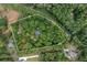 Aerial view showing property boundaries in a wooded setting at 6637 Victory Dr, Acworth, GA 30102