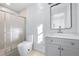 Modern bathroom with gray vanity and shower at 2301 Troy Cove Rd, Decatur, GA 30035