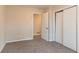 Bedroom with neutral paint, carpet, and a closet at 2405 County Line Sw Rd, Atlanta, GA 30331