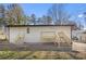 Exterior view of the backyard with new stairs leading to the back entrances at 2529 Dale Creek Nw Dr, Atlanta, GA 30318