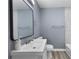 Updated bathroom features a modern sink, toilet, and light blue walls at 2529 Dale Creek Nw Dr, Atlanta, GA 30318