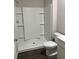 Bathroom with a large shower and toilet at 6615 Bluffview Dr, Douglasville, GA 30134