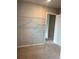 Spacious walk-in closet with wire shelving and neutral carpet at 6615 Bluffview Dr, Douglasville, GA 30134