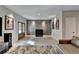 Spacious basement recreation area with French doors and a contemporary herringbone accent wall at 6770 Cadence Blvd, Atlanta, GA 30328