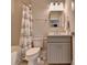 Clean bathroom with a shower/tub combo and updated vanity at 6770 Cadence Blvd, Atlanta, GA 30328