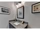 Modern bathroom vanity with gray countertop and sleek mirror at 6770 Cadence Blvd, Atlanta, GA 30328