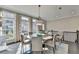 Sunlit dining room featuring a round wooden table at 6770 Cadence Blvd, Atlanta, GA 30328