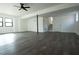 Finished basement features an open layout, dark grey flooring, and ample natural light at 2688 Heritage Ln, Morrow, GA 30260