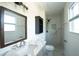 Modern bathroom with marble shower, vanity, and updated fixtures at 2688 Heritage Ln, Morrow, GA 30260