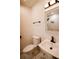 Clean bathroom with marble flooring and updated vanity at 2688 Heritage Ln, Morrow, GA 30260