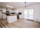 Modern kitchen with white cabinets, stainless steel appliances, and an island at 2688 Heritage Ln, Morrow, GA 30260